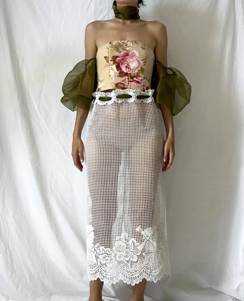 Front of this vintage bustier tapestry dress with curtain skirt and bouffant sheer sleeves