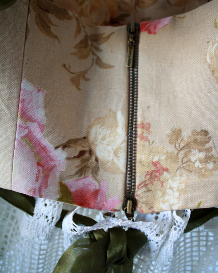 Close up of the back and closure of this tapestry bustier dress