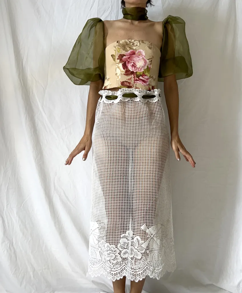 Front of this vintage bustier tapestry dress with curtain skirt and bouffant sheer sleeves