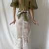 Back of this vintage bustier tapestry dress with curtain skirt and bouffant sheer sleeves