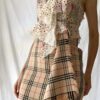 Detail of the different textures of this bustier nova check one shoulder plaid dress