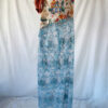 Front of this tapestry bustier sequined sheer dress with one sleeve