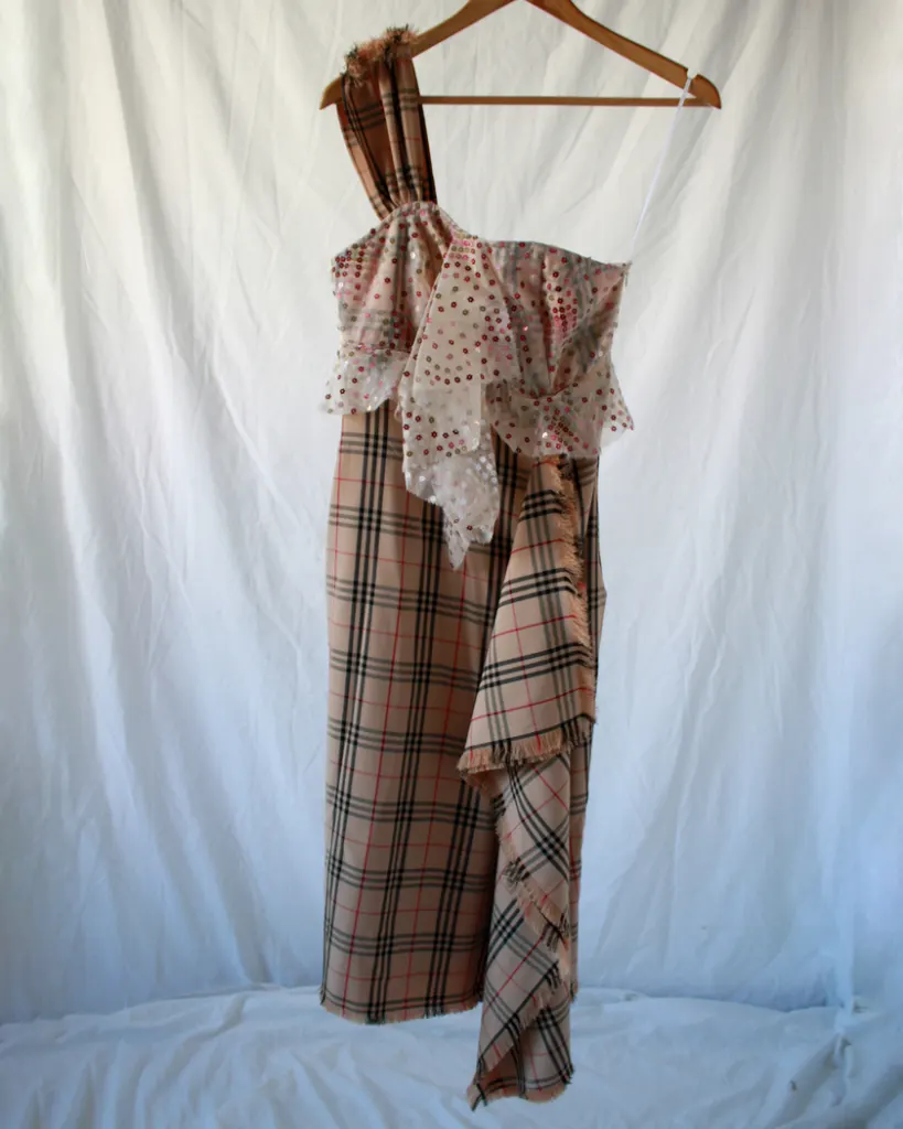 Front of the nova check plaid one shoulder dress