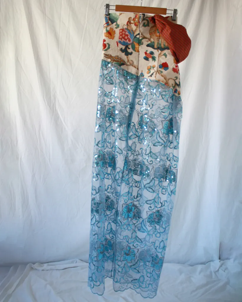 Back of this tapestry bustier sequined sheer dress with one sleeve
