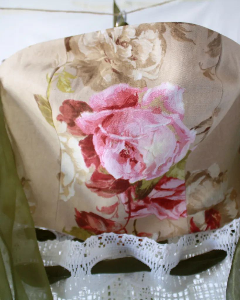 Close up of the different textures and waistline of this tapestry bustier curtain dress