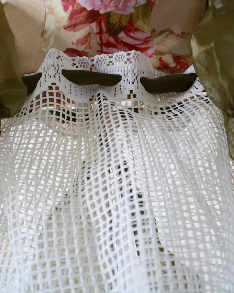 Close up of the different textures and waistline of this tapestry bustier curtain dress